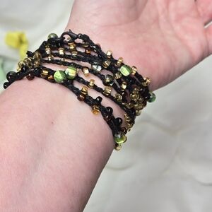 Handcrafted Beaded Bracelet with Black and Green Accents